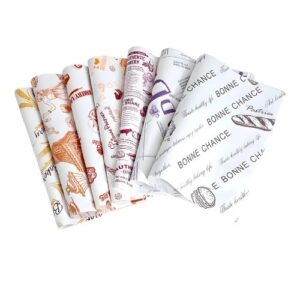 Grease-proof custom printed sandwich wrapping paper from Alkahf Group, Dubai — perfect for restaurants, cafes, and takeaways.